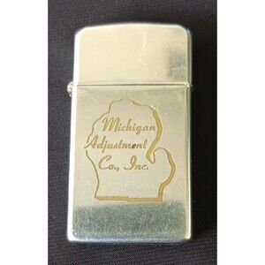 ZIPPO Slim Vintage LIghter Engraved Michigan Adjustment Co, Inc 1967